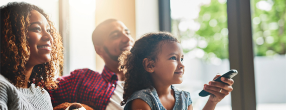 Parent and child watch television