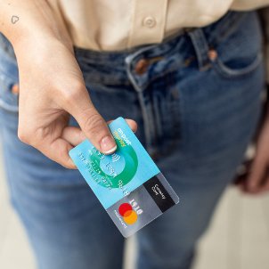 Hand holding currency card 