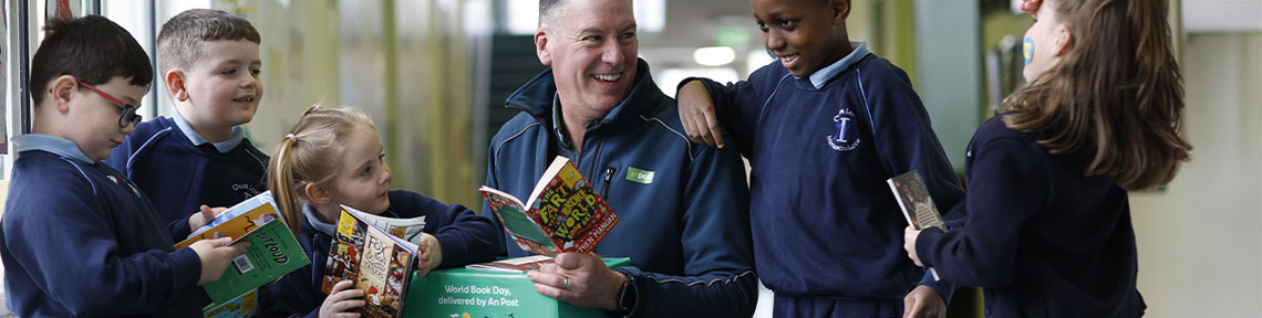 Man reading with children