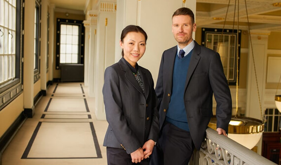 Image of two An Post retail staff on the GPO Balcony.