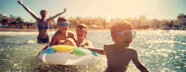 Boys playing in swimming pool