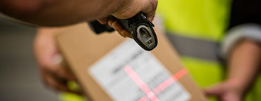 Man scanning parcel