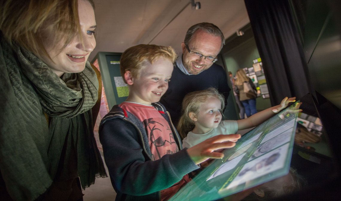 family reading about the gpo on a panel